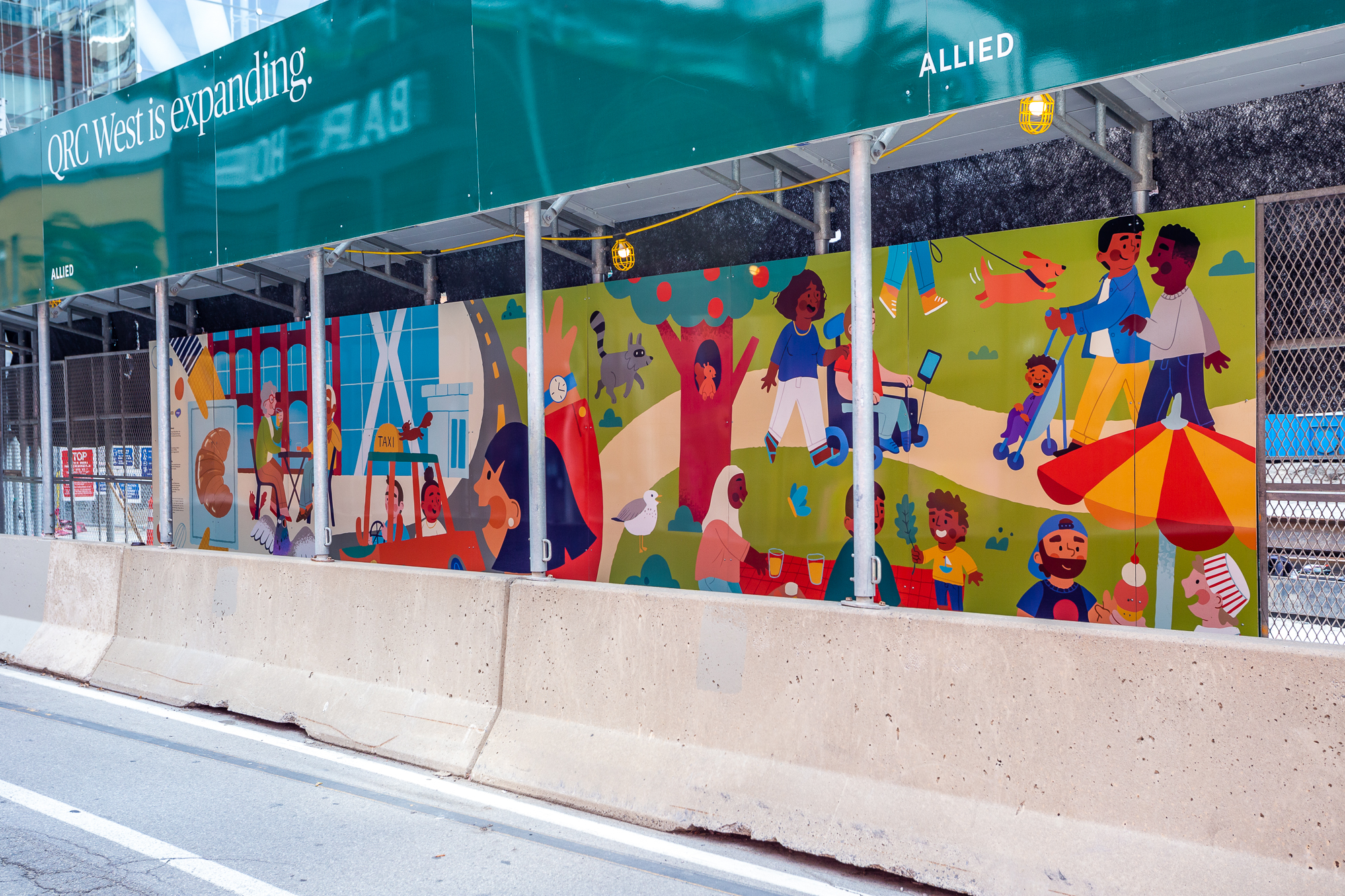Hoarding exhibit by Lindsay Hill with colourful and bold illustrations of people enjoying their time at parks, navigating through city streets and living in the city.