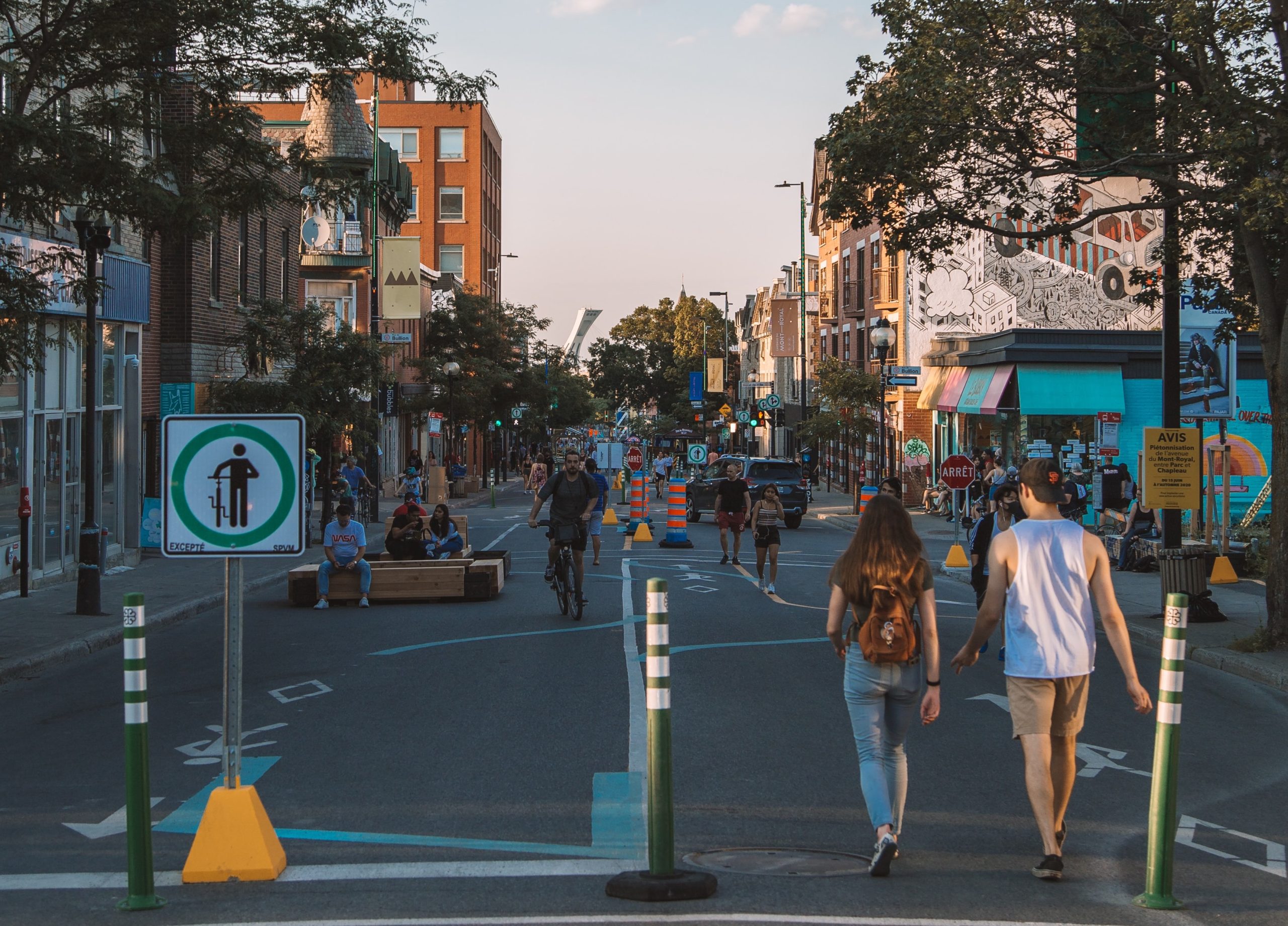 Pedestrians enjoy the open air streets of Montreal, closed to vehicles in the summer