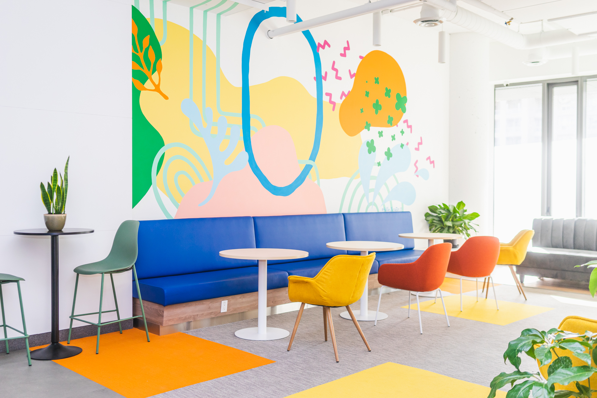 Indoor mural featuring colourful patterns and shapes