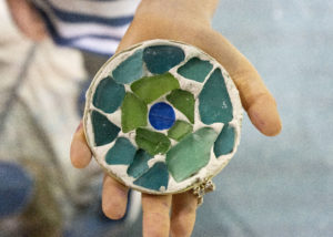 Green mosaic art from community-engaged workshop