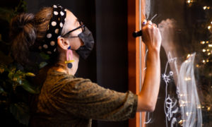 In the Rosedale BIA in Toronto, artist Asli Alin animates a window with white line drawing