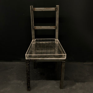 PHoto of artwork by Lily Li of a sculptural chair with spikes.