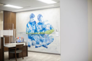 An interior mural at a bank in Fredericton by artist Laura Forrester as part of STEPS Public Art's BMO National Mural Series