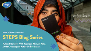 A close up image shows artist Yasmeen Nematt Alla holding a card as part of her interactive art project "Commuting and other lonely thoughts" A teal graphic below reads: "STEPS Blog Series, artist interview with Yasmeen Nematt Alla, 2021 CreateSpace Artist-In-Residence"