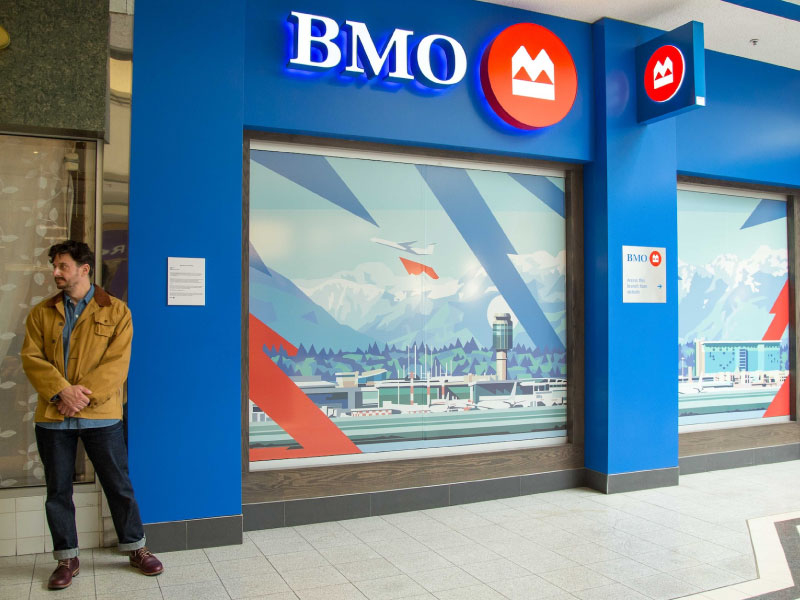 A BMO bank inside Lansdowne Centre in Richmond, BC with an exterior vinyl mural by artist Kyle Scott as part of STEPS Public Art's BMO National Mural Series