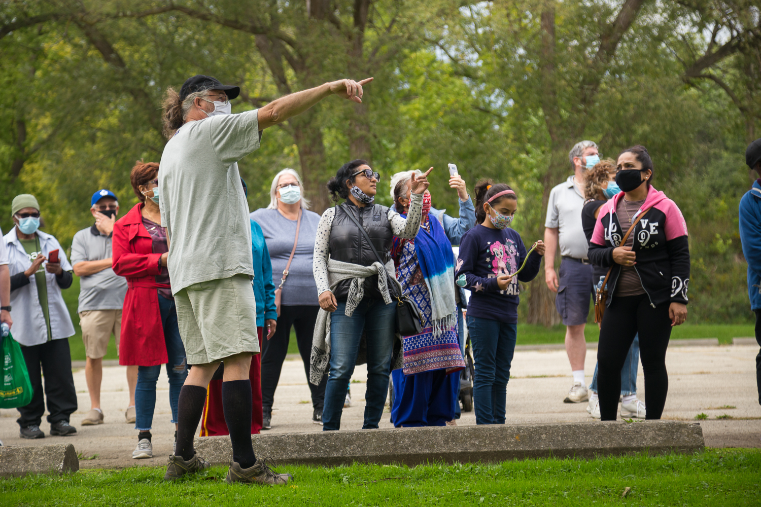 Community members together at Rowntree Mills Park in Toronto's Rexdale neighbourhood