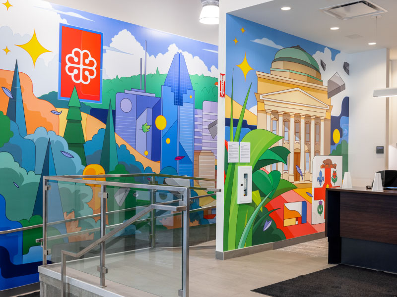 An interior digital vinyl mural of cityscapes in Quebec by artist Lucas Saenger as part of the BMO National Mural Series by STEPS Public Art