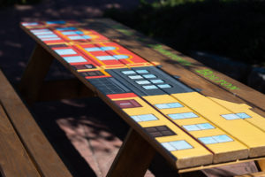 Painted picnic table of heritage homes of Downtown Bolton, Ontario by artists Alessandra Vai and Gaby Franks