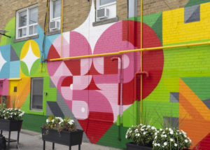 A colourful mural of a heart in Toronto's Willowdale neighbourhood by artists Peru Dyer Jalea and Leyland Adams