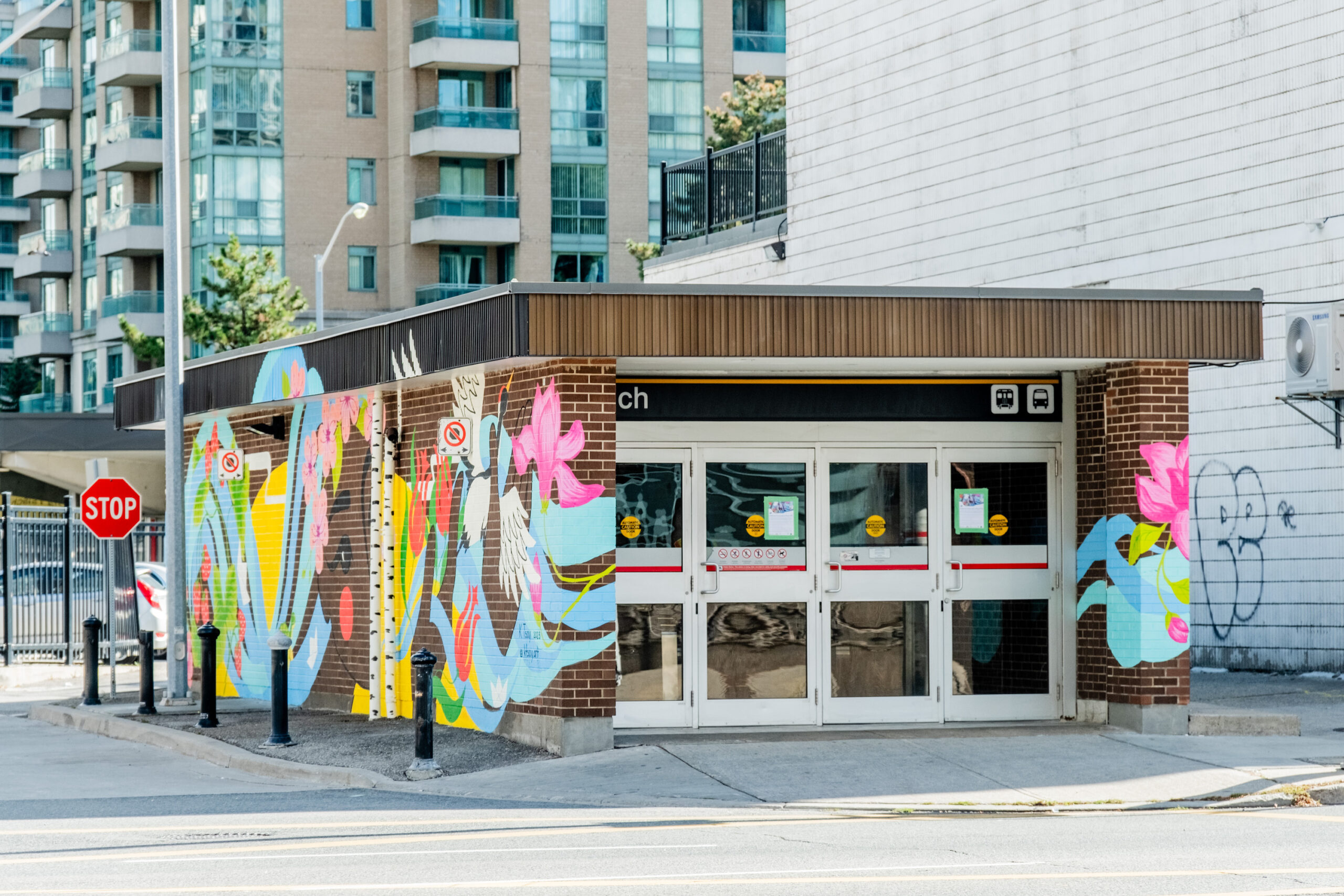 The entrance to Toronto's Finch subway station with the Crossroads mural by Kseniya Tsoy
