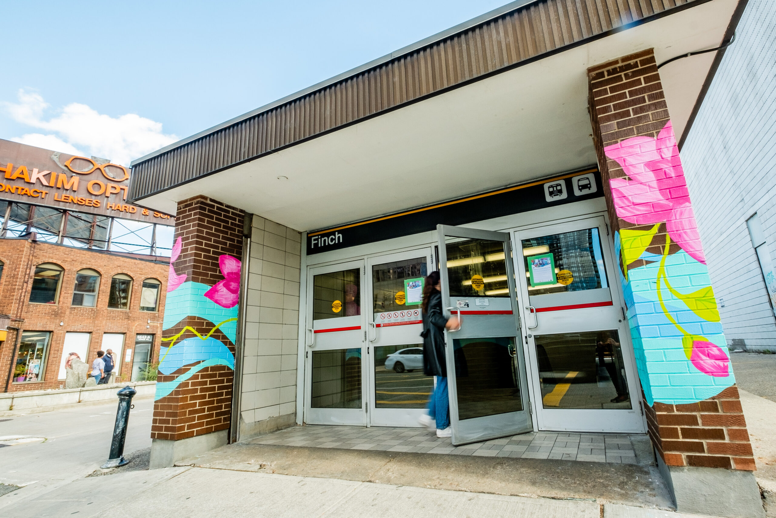A person walking into Finch subway station in Toronto