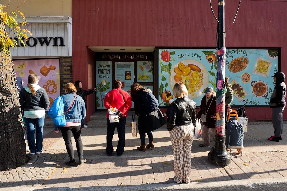 Participants of a public art walking tour led by artist Meegan Lim